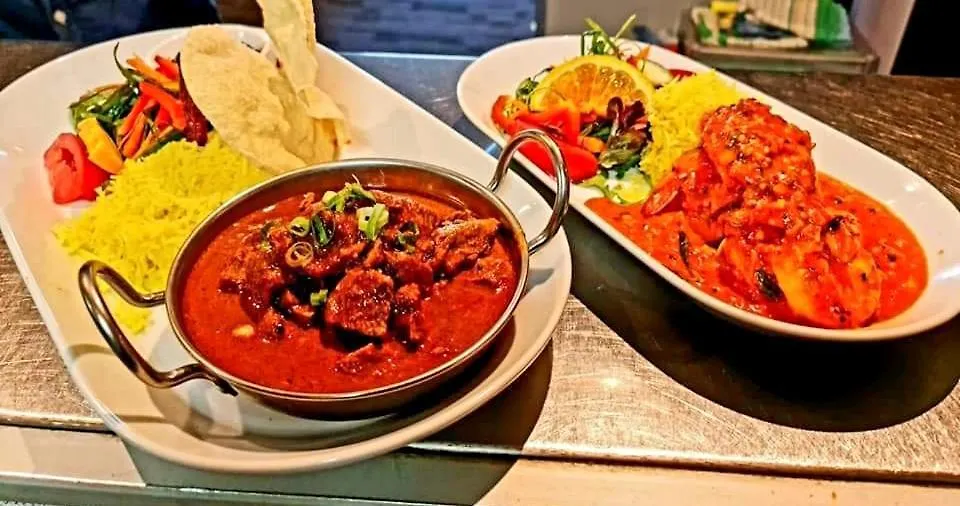 Qure Restaurant And Apartments Canberra Bruce