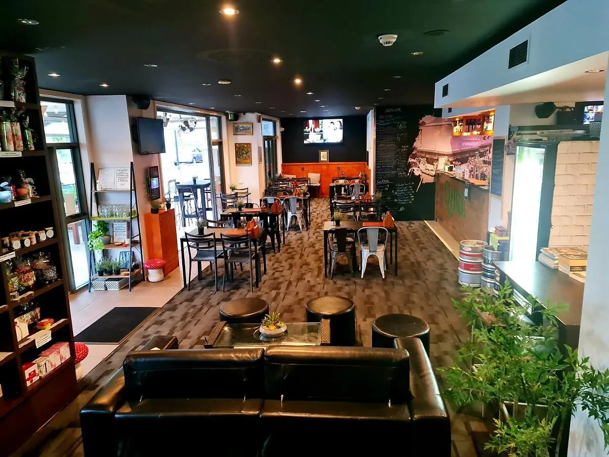 Qure Restaurant And Apartments Canberra Bruce