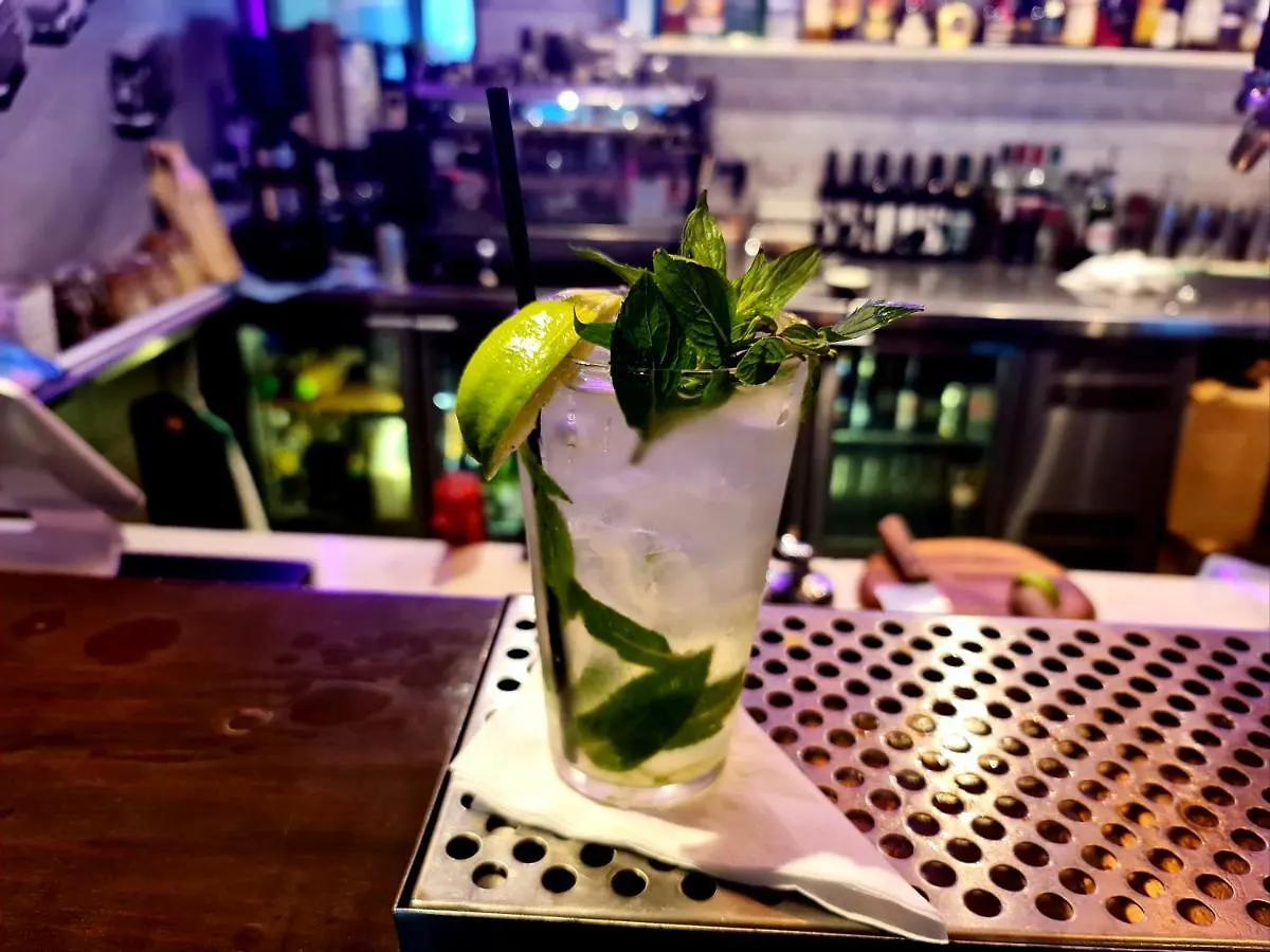 Qure Restaurant And Apartments Canberra Bruce