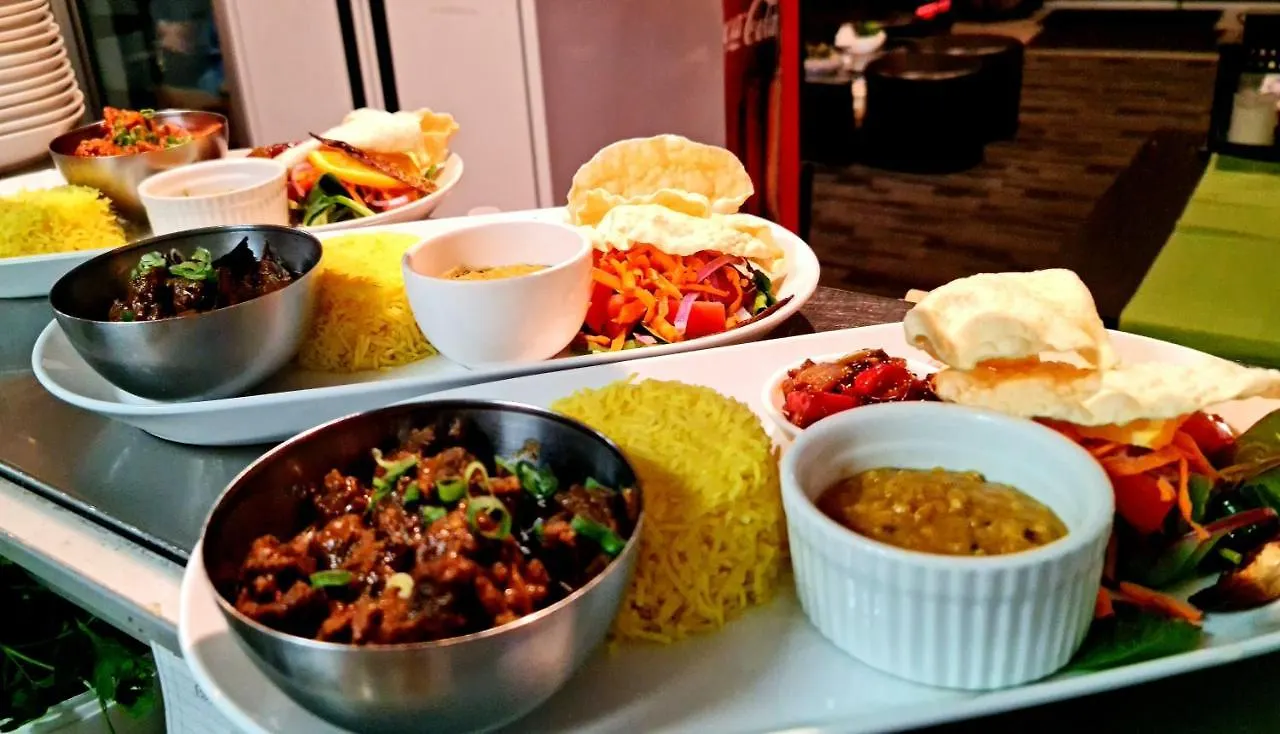 Qure Restaurant And Apartments Canberra Bruce